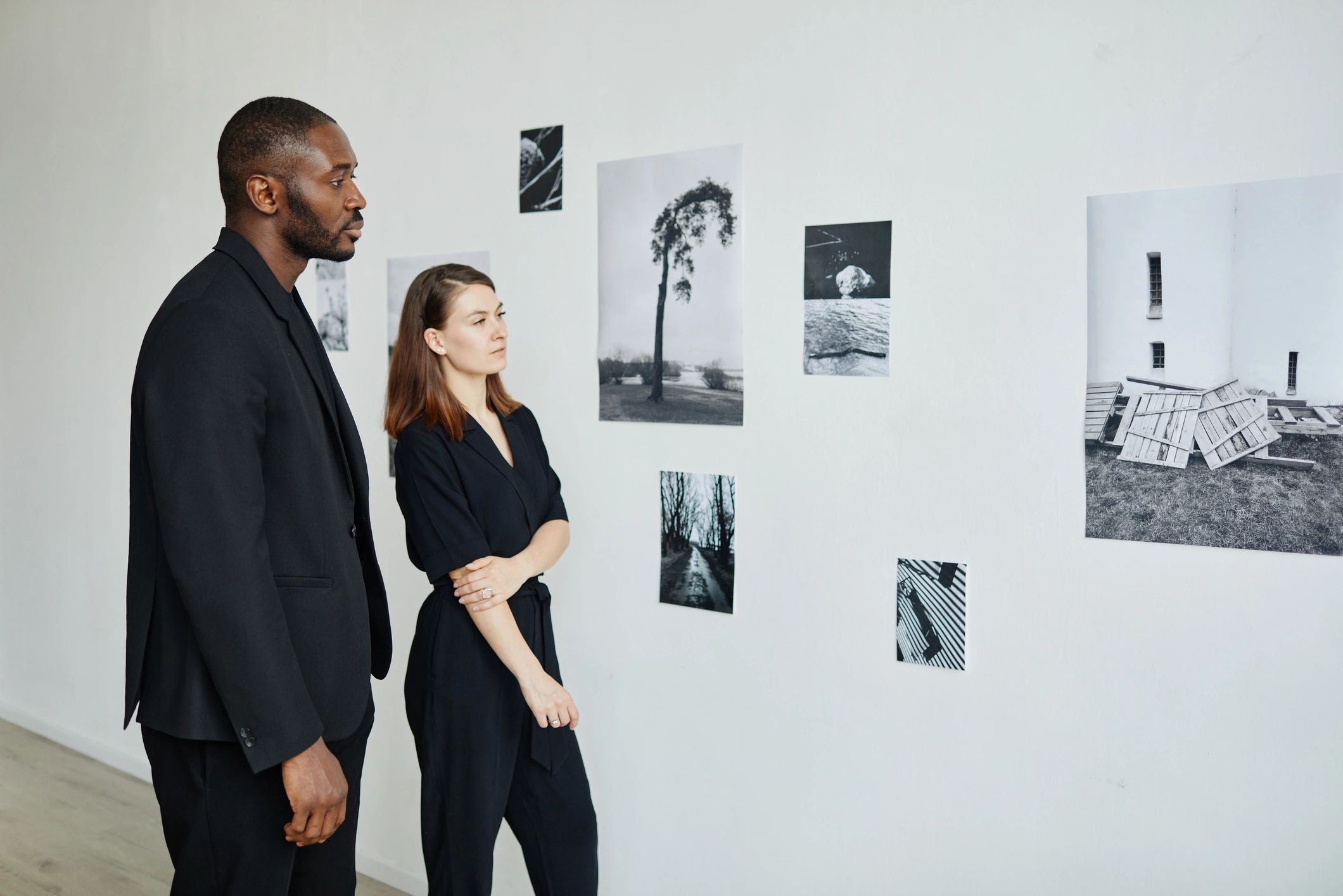 Portrait of elegant mixed-race couple wearing black while